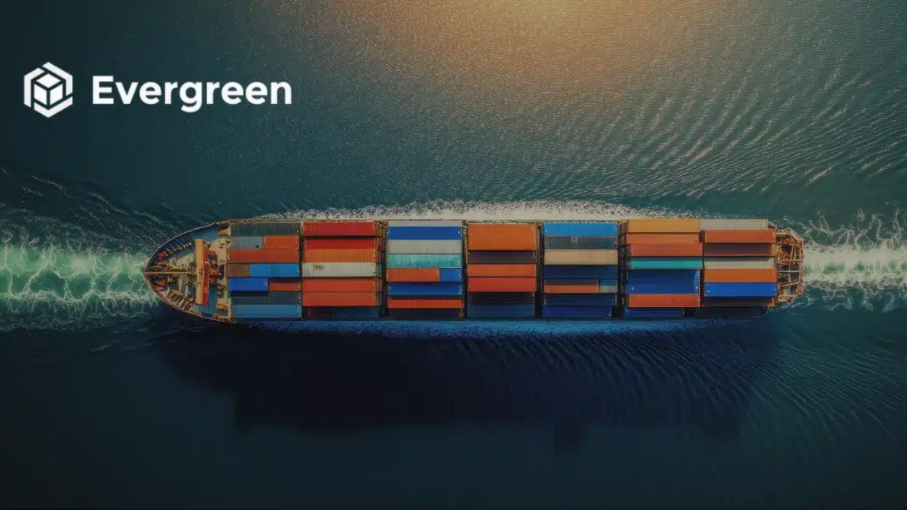 Evergreen logo over an aerial view of a container ship
